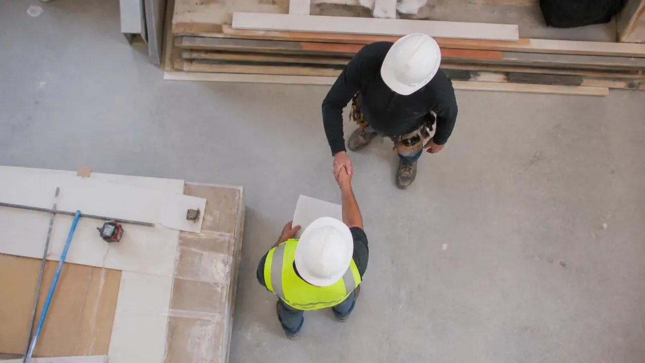 A build-out scene illustrating retainage: the leverage you hold back, shot from directly overhead in bright even light
