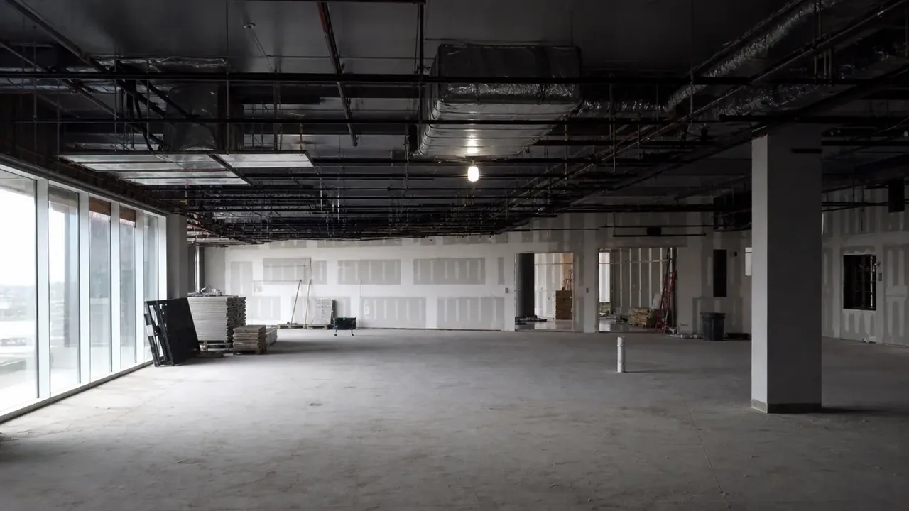 An unfinished hospitality room used to illustrate furniture-package coordination